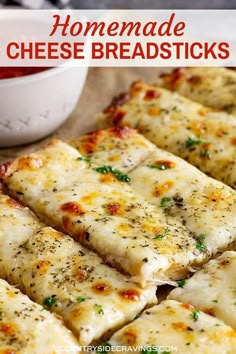 homemade cheese breadsticks are cut into squares