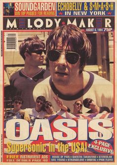 a magazine cover with an image of the band oasis on it's front page