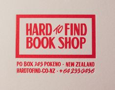 a red and white business card with the words hard to find book shop