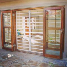 an open patio with sliding glass doors leading outside