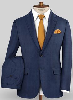 Define your style and build your wardrobe around your lifestyle with our Caccioppoli Sun Dream Kizzu Blue Wool Silk Suit. Crafted from wool and silk, the Super 150's wool suit has navy blue hue which is elegant for smarter occasions or even works well for formal venues. Pair it with a matching waistcoat, a crisp white shirt, yellow tie and brown dress shoes. 
 
 Look Includes  Caccioppoli Sun Dream Kizzu Blue Wool Silk Fabric  Two Button Jacket Style  Notch Lapel  Real Horn Royal Buttons  Single Navy Luxury Wool Suit, Navy Long Sleeve Wool Suits, Royal Blue Long Sleeve Business Suit, Elegant Blue Formal Unstitched Suit, Tailored Blue Wool Suit, Fitted Royal Blue Suits For Office, Royal Blue Fitted Suits For Office, Formal Blue Unstitched Suit, Fitted Royal Blue Office Suit