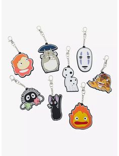 six different key chains with cartoon characters on them