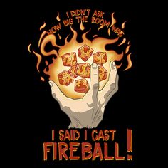 someone is holding up some dices in front of their face with fireball on it