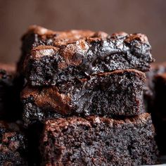 chocolate brownies stacked on top of each other