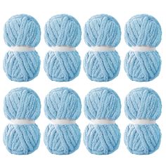 nine balls of blue yarn are arranged in rows