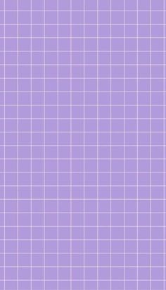 a purple tiled wall with white squares on it