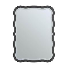 a square mirror with black trim around the edges and an oval frame on top of it