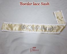 ☸ Custom Pageant Lace Sash ☸ ☸ Personalized your perfect sash for your bachelorette parties, bridal showers, birthday parties, graduation, beauty pageants, or any special event. ☸ Silky single faced high-quality satin ribbon with glitter or foil lettering. Make it your own with your text. ☸ Product ☸ ☛ Material: 100% Satin Ribbon sash. ☛ Printing : Vinyl Heat Press ☛ Sash Size :(Default size XL if not given) * Please Check Listed images For: ➼ Sash Colors Available ➼ Sash Size Chart ➼ Font Color Pageant Sashes, Lace Sash, Custom Sash, Bridesmaid Sash, Border Lace, Wedding Sash Belt, Simple Face, Wedding Sash, Wedding Belts