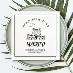 a wedding card with two cats on it and the words married written in black ink