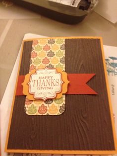 a close up of a thank you card on a table