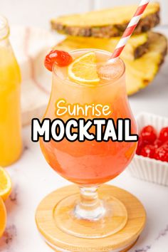 a drink with the words sunrise cocktail in front of it and various fruits around it