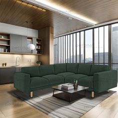 a living room with a large green couch