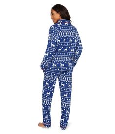 Everyone’s heard of a blue christmas, but that’s a little outdated. It’s also a little sad – so we’re moving on, needless to say. The Women’s Blue Reindeer Pajama Set is all of the holiday blue your wardrobe needs without making it an entirely blue christmas. This one’s just blue reindeer, and there’s nothing sad about a unique, brightly colored coat. Blue Christmas Pajamas, Blue Character Print Sleepwear, Blue Character Print Sleepwear For Playtime, Reindeer Pajamas, Playful Blue Printed Sleepwear, Blue Long Sleeve Sleepwear With Character Print, Tipsy Elves, Holiday Blues, Christmas Outfits Women