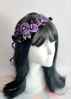 a mannequin headpiece with flowers on it