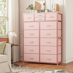 a pink chest of drawers in a living room