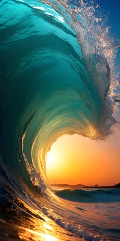 an ocean wave with the sun setting in the background