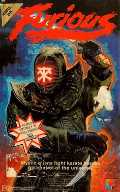 an old movie poster with a man holding a knife in his hand and wearing a helmet