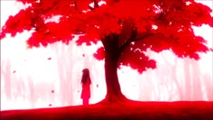 a person standing under a red tree in the middle of a forest with leaves on it