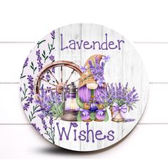 a wooden sign that says lavender wishes with purple flowers and an old spinning wheel in the background