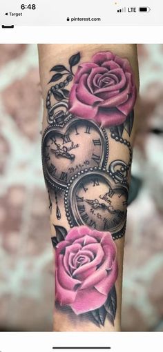 a rose and pocket watch tattoo on the left arm, with roses in the middle