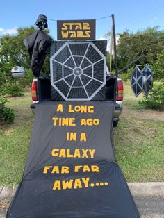 a star wars themed truck with darth vader's helmet on the back