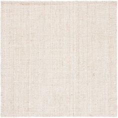 a white rug with small squares on the bottom and one square in the middle, against a