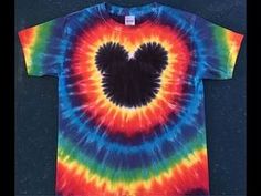 a tie - dyed mickey mouse heart t - shirt