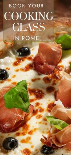 a close up of a pizza with olives and ham on it's crust