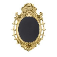 an ornate gold framed mirror on a white background