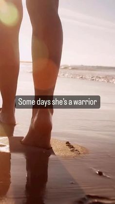 someone is walking on the beach with their feet in the water and some days she's a warrior