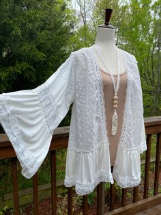 Stevie nicks style white lace cardigan, bohemian, brand new, size small, white lace kimono, country chic lace cardigan Great style for all body types. Layer with shorts, strapless dress or for a beach cover up Sizing: Standard womens U.S. sizing  Small 4-6 Medium 8-10 Large 12-14 Xlarge 16-18 2x 20-22 3x 24-26 White Long Sleeve Cardigan For Beach Cover-up, Bohemian Fitted V-neck Outerwear, Oversized Bohemian V-neck Outerwear, White V-neck Summer Outerwear, Oversized White Summer Outerwear, Oversized Cardigan For Spring Festival, White Fall Cardigan For Vacation, Non-stretch Bohemian V-neck Cardigan, Non-stretch V-neck Bohemian Cardigan