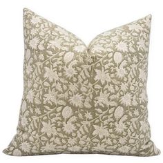 a beige and white pillow on a white background