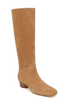 Smooth leather wraps the streamlined upper of this square-toed knee-high boot resting on a playfully canted column heel. 2" heel (size 8.5) 16" shaft; 14 1/4" calf circumference Leather upper, lining and sole Imported Wide Calf, Fabric Gift Bags, Leather Wraps, Stacked Heel, Boot Shoes Women, Knee High Boots, Mid Calf, Smooth Leather, Nordstrom Rack