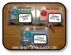 three clear plastic containers filled with different types of cards and magnets on top of a wooden table