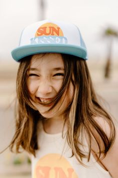 Summer is for sunkissed hair! Enjoy the ocean breeze while walking the boardwalk in this trucker hat. Made in Los Angeles Trendy Trucker Hat With Curved Bill For Beach, Trendy Curved Bill Trucker Hat For Beach, Cute Baseball Cap For Beach In Spring, Cute Baseball Cap For Beach Spring Season, Blue Snapback Hat For Beach And Summer, Blue Snapback Hat For Beach Summer, Blue Summer Trucker Hat, Summer Snapback Trucker Hat With Upf 50+, Blue Adjustable Summer Trucker Hat