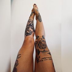 a person with tattoos on their legs