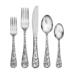 an assortment of silverware including forks, knives and spoons with floral designs on them