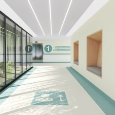 an empty room with glass walls and blue flooring