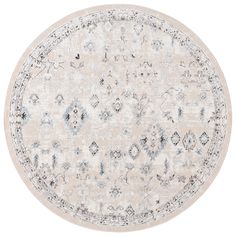 a round rug with an ornate design on the center and bottom, in light grey tones