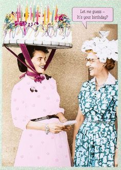 two women wearing hats with candles on top of their heads, one holding a knife and the other smiling