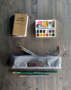 I've made this zippered pouch with artists in mind. Usually zippered pouch are not so long, but paint brushes sometimes are very long, so it is not possible to put them in a normal size pouch. This pouch is very long, you can put in it brushes long up to 31 cm! But also rulers that usually are longer than normal pouches. This case is made with waxed canvas, it is very resistant and water resistant. It has scratches on it that give to the fabric an unique vintage look that will become unique with Pouch With Zipper, Waxed Canvas Bag, Canvas Cosmetic Bag, Cute Canvas, Zippered Pouch, Waxed Canvas, Pen Case, Pencil Pouch, Boho Bag