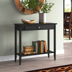 This classic and functional console table is the ideal accent piece for your living room, dining room, or entryway. Built from solid acacia wood, this table showcases a finish that highlights the wood's natural grain. Its airy silhouette rests on sleek, tapered legs for a modern silhouette. A single drawer opens to reveal room for gloves, pet leashes, and mail, The open shelf gives you even more room to display decor, a set of baskets, or for organizing out-the-door essentials. Plus, this table Simple Crown Molding, Small Entryway Table, Console Table Wood, Bathroom Artwork, Small Entryway, Pet Leashes, Wood Console Table, Table Wood, Wood Console