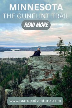 a man sitting on top of a cliff with the text minnesota the gunflint trail read