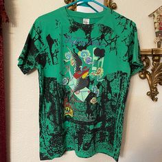 Brand New With Tags Boys Ed Hardy Green And Black Short Sleeved Tee. Youth Sizing (Big Boys). Size L And Xl Available. Handsome Shirt! Retro Green Printed T-shirt, Green Cotton T-shirt With Character Print, Multicolor Cotton Band Merch Tops, Retro Green Screen Print Shirt, Green Grunge T-shirt For Spring, Green Band Merch Shirt With Screen Print, Green Band Merch Top With Sublimation Print, 90s Style Green T-shirt For Spring, Green Tops With Character Print For Spring