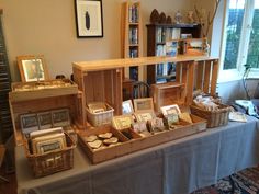 a table with baskets and books on it