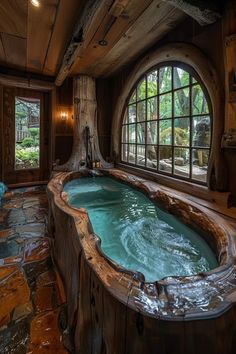 a large hot tub sitting in the middle of a living room next to a window