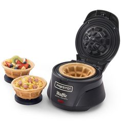 the waffle maker has three different types of food in it's trays