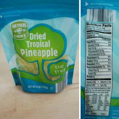 a bag of frozen tropical pineapples sitting on top of a wooden table