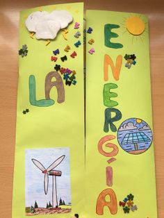 two paper bags with pictures and words on them, one is made to look like a wind turbine