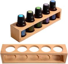 an essential oil rack with six bottles in it